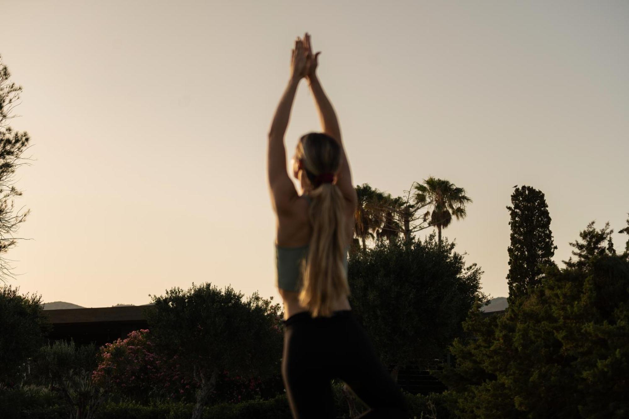 Minos Palace Resort - Adults Only Agios Nikolaos  Exterior photo A woman practicing yoga